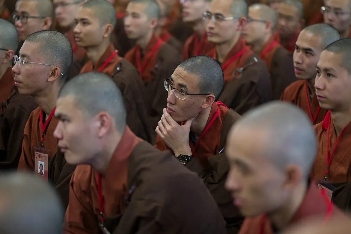 Monk listening intently